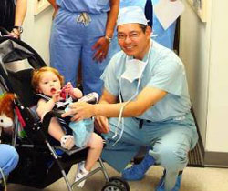 Dr. Diaz with Cadyn Elizabeth, the first baby born in 2005 from frozen eggs at Frozen Egg Bank, Inc.