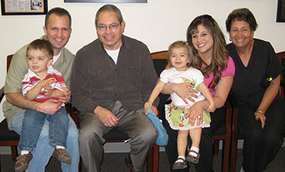 Dr. Diaz (center) and Joan Moody N.P. (right) meeting with David and Stephanie Nichols and their second set of twins: Brayden and Sierra, born with the help of IVF.