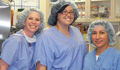 Embryologist Susan Walker (at left), from The Fertility Center of Chattanooga, shown with Frozen Egg Bank staff, Andrologist Christine Stevens (middle) and Senior Embryologist Cris Rodriguez-Karl.(right)
